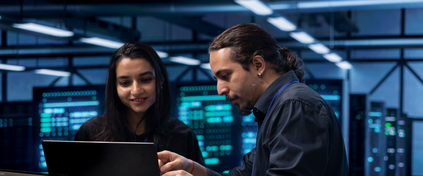programmers-in-data-center-using-laptop-to-check-f-2025-02-19-23-57-04-utc